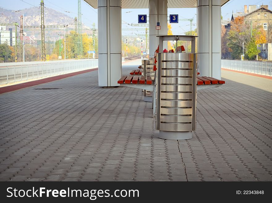 Metal trash can on a railway station. Metal trash can on a railway station