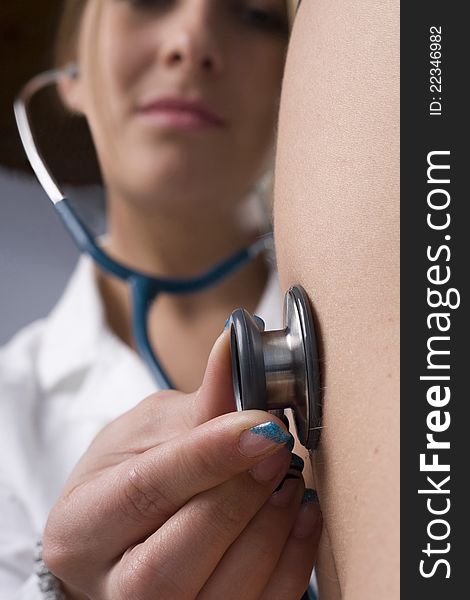 The photography stethoscope examination of the patient. The photography stethoscope examination of the patient