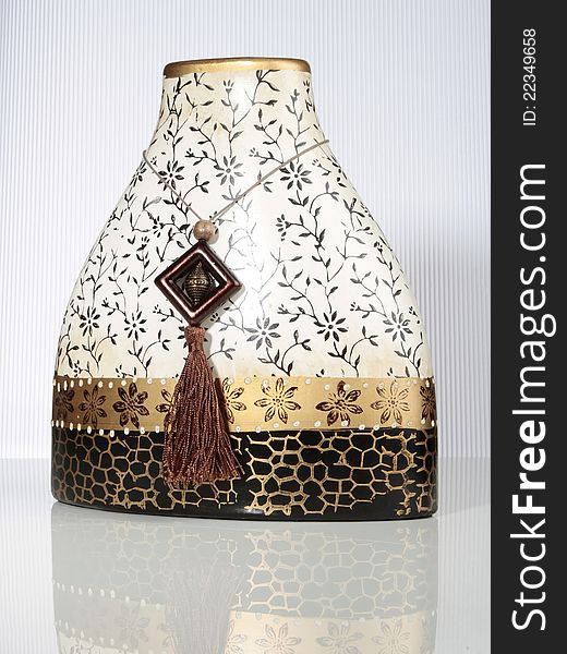A beautiful handmade, painted ceramic flower vase. A beautiful handmade, painted ceramic flower vase