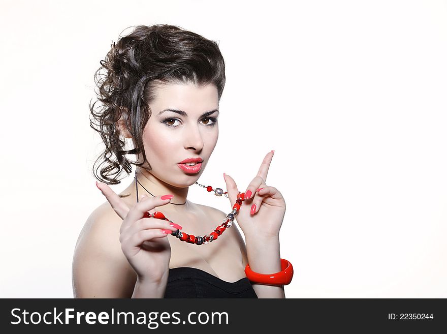 Beautiful girl with curly hairstyle and bright makeup on white background. Beautiful girl with curly hairstyle and bright makeup on white background