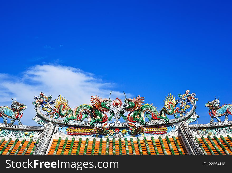 Beautiful twin dragon with blue sky and couple lion