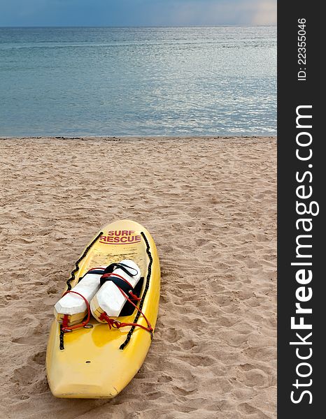 Yellow canoe rescue on the sand tropical beach