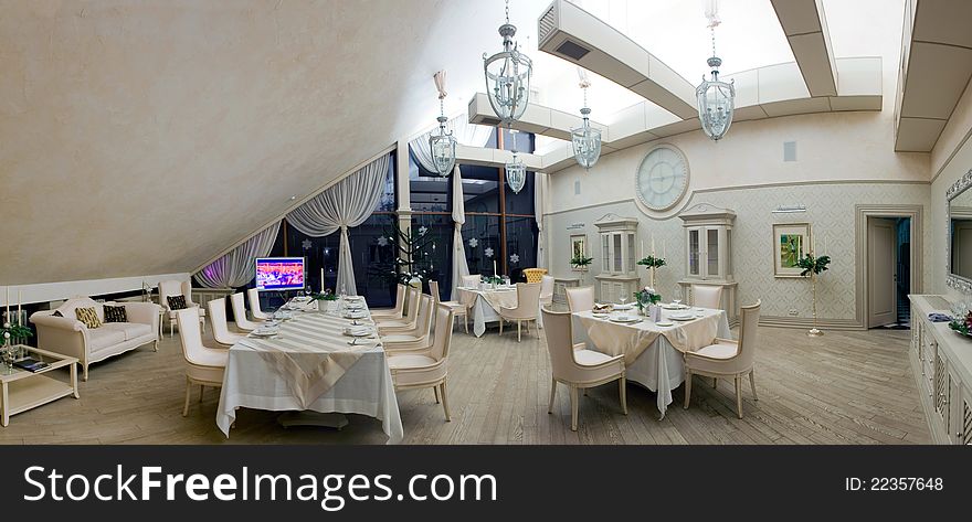 Portrait of luxury restaurant with beautiful stylish interior and comfortable furniture. Portrait of luxury restaurant with beautiful stylish interior and comfortable furniture