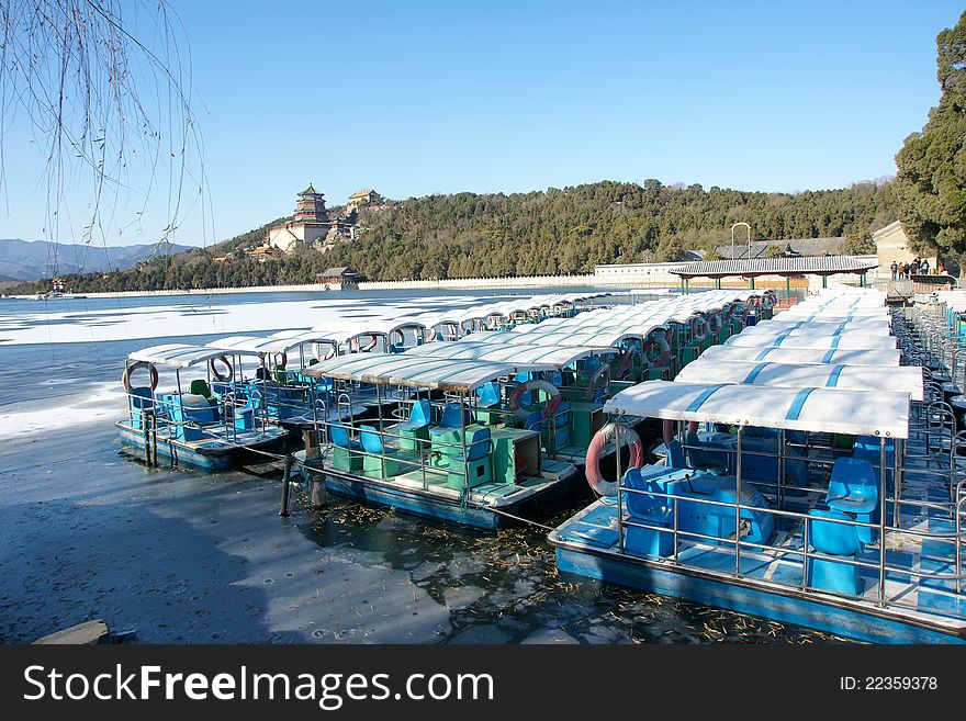 The yachts of Summer Palace in Beijing, China. Summer Palace is the royal garden of Qing Dynasty China. The yachts of Summer Palace in Beijing, China. Summer Palace is the royal garden of Qing Dynasty China.