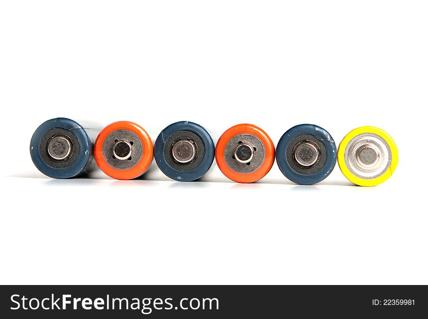 Six alkaline batteries on a white background. Six alkaline batteries on a white background