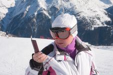 Skier In The Mountains With A Mobile Phone Stock Photos
