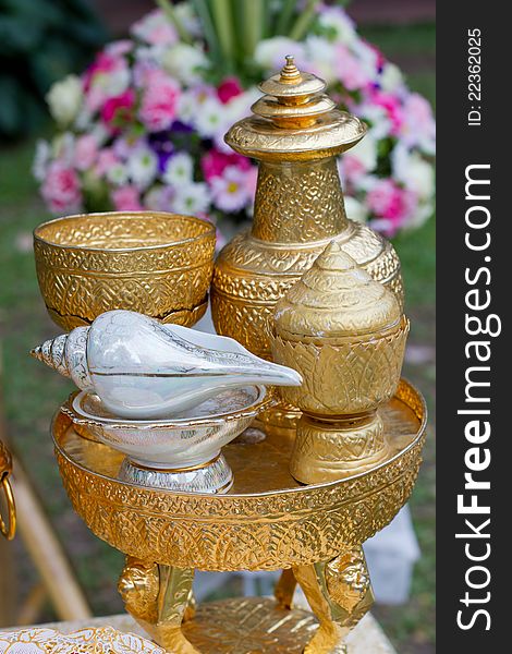 The Thai Water Ceremony (or in Thai, Rod Nam Sang) is a traditional Thai wedding ceremony. The blessing of the couple with lustural water. A conch shell for watering to bless the bride and groom