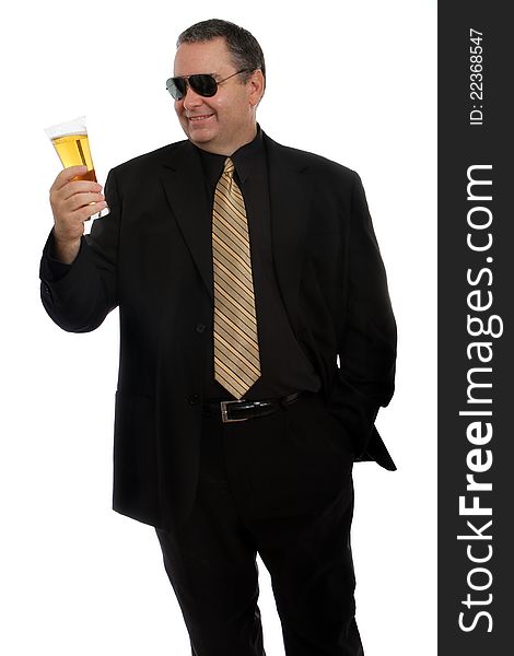 Man inspecting his glass of beer