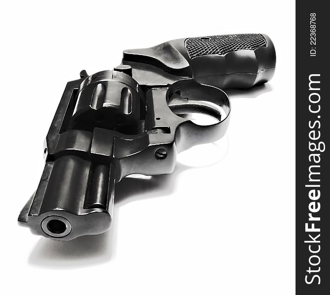 Small .22 caliber black revolver.