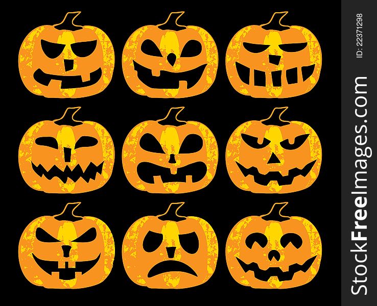 A set of scary halloween pumpkins on a black background. A set of scary halloween pumpkins on a black background