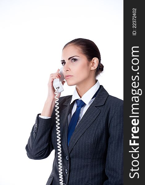 Concentrated Businesswoman Talking On Phone