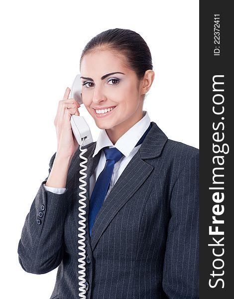 Young businesswoman speaking on phone, smiling, isolated on white