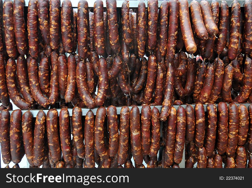 Delicious sausage drying in the sun