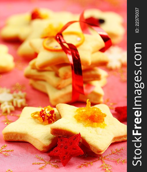 Christmas butter cookies on red background