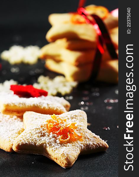 Christmas butter cookies on black background