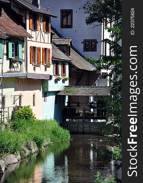 Riverside houses in a village in alsace on the french german border. Riverside houses in a village in alsace on the french german border