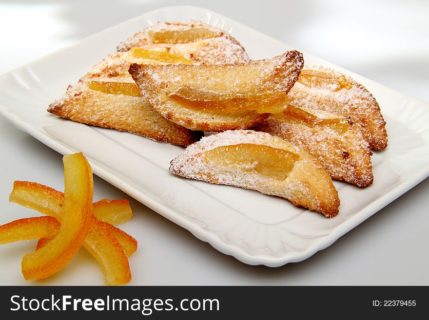 Sweet biscuits whit orange on white background. Sweet biscuits whit orange on white background