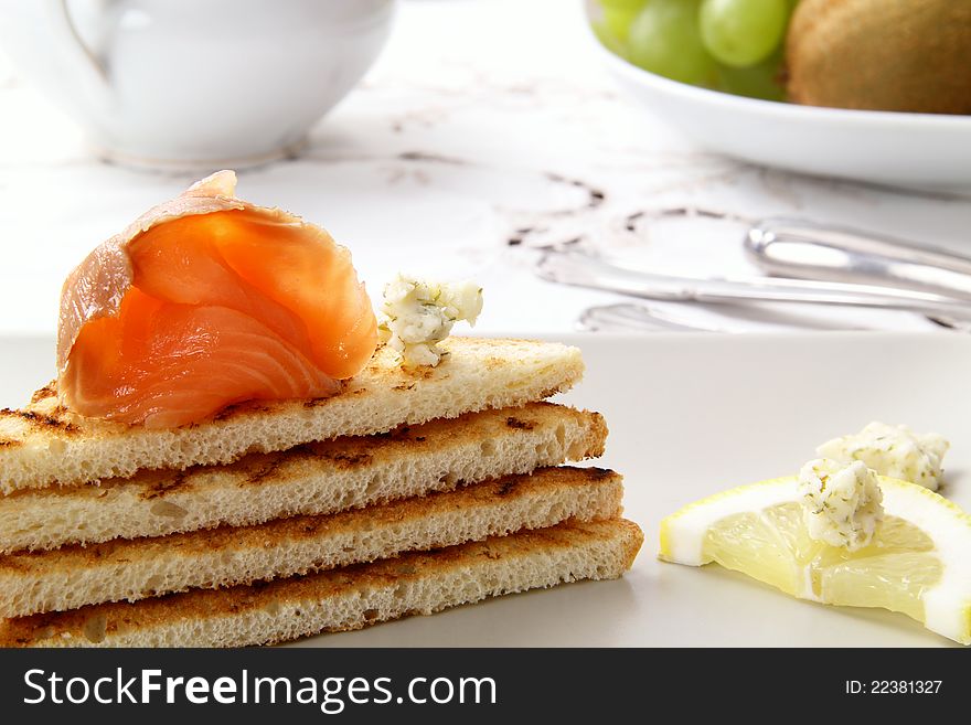 Salmon smoked end bread on white background