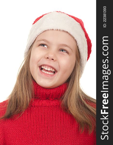 Portrait of beautiful little girl wearing santa claus clothes. Isolated on a white background