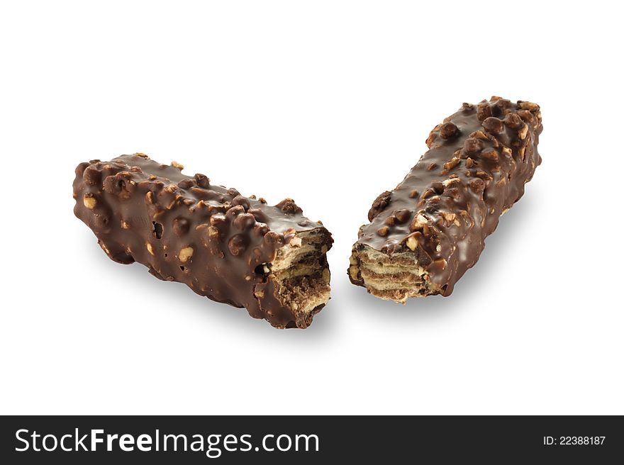 Broken waffle in chocolate with shredded nuts isolated on white background. Broken waffle in chocolate with shredded nuts isolated on white background