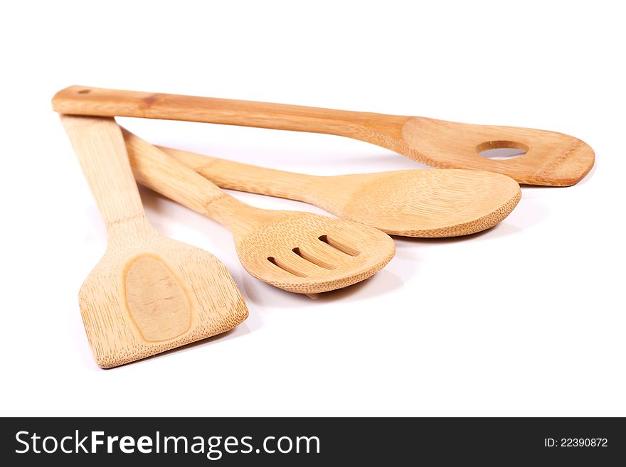 Wooden kitchen utensils  on white background