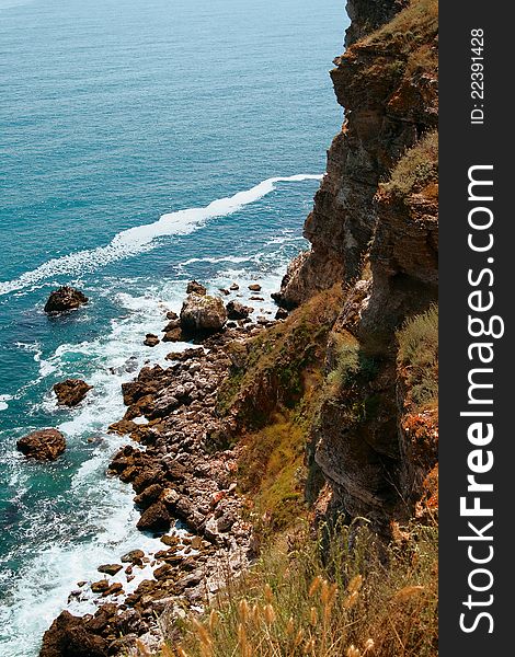 The rocky sea shore and waves, black sea, seascape. Kaliakra, Bulgaria. The rocky sea shore and waves, black sea, seascape. Kaliakra, Bulgaria.