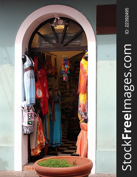 Colorful wares grace the entrance to a Caribbean island shop. Colorful wares grace the entrance to a Caribbean island shop