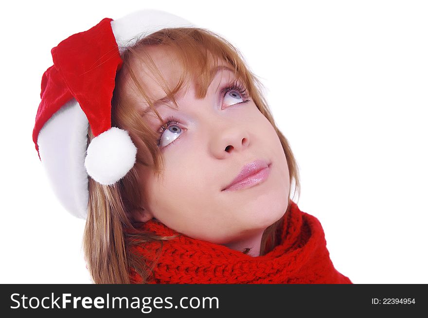 Girl with christmas hat and scarf over white. Girl with christmas hat and scarf over white