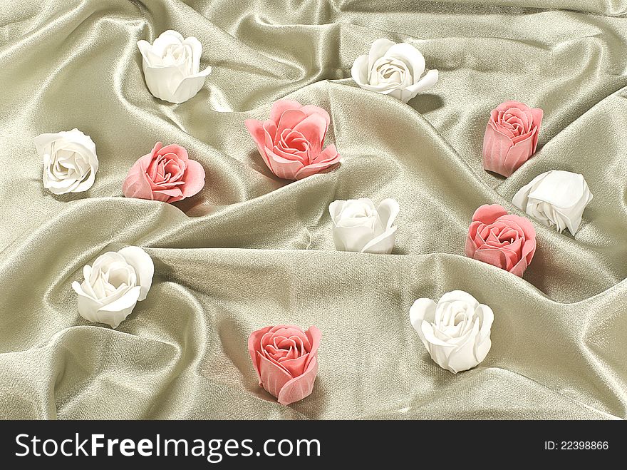 Pink and white rosebuds in silk