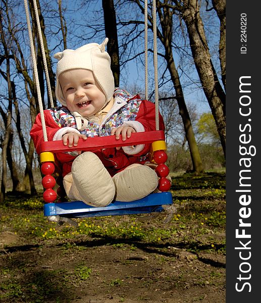 Swinging Little Boy