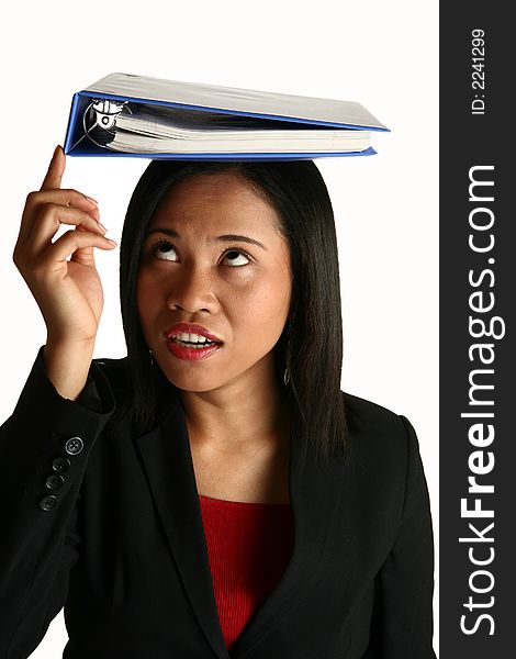 Beautiful chinese indonesian business woman balancing book on head.