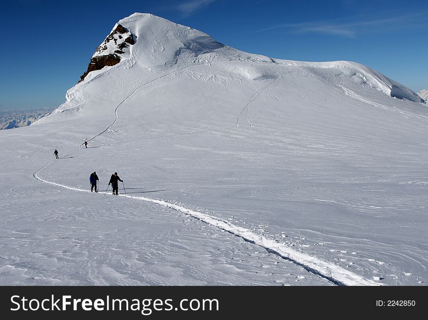 Ski touring on mountain plateau