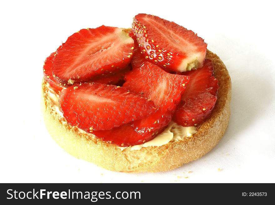 Dutch delicacy: cracker with butter and strawberries. Dutch delicacy: cracker with butter and strawberries