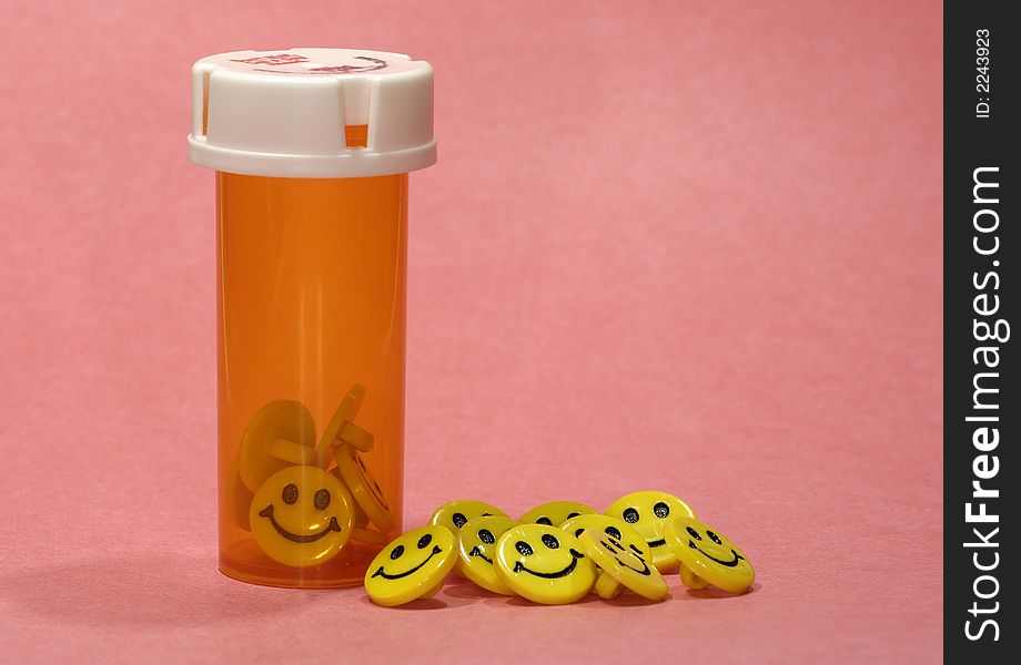 Photo of a Prescription Bottle and Smily Faces. Photo of a Prescription Bottle and Smily Faces