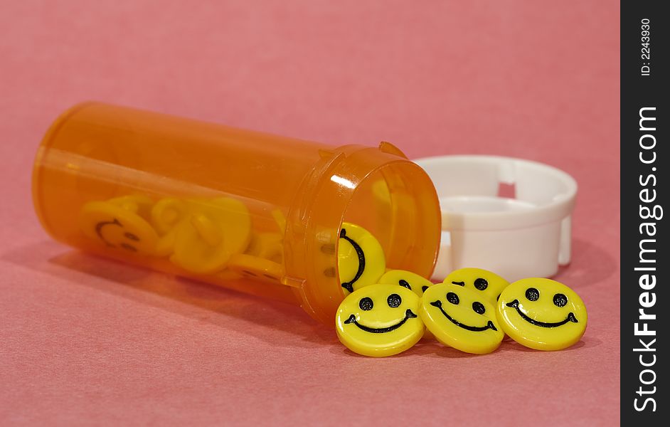 Photo of a Prescription Bottle and Smily Faces. Photo of a Prescription Bottle and Smily Faces