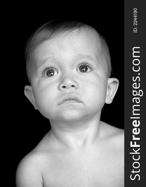 Black and white image of beautiful 10 month old baby boy. Black and white image of beautiful 10 month old baby boy
