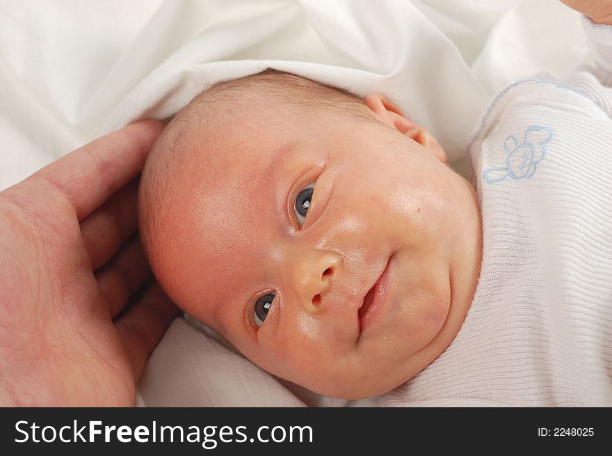 Newborn child on white background. Newborn child on white background