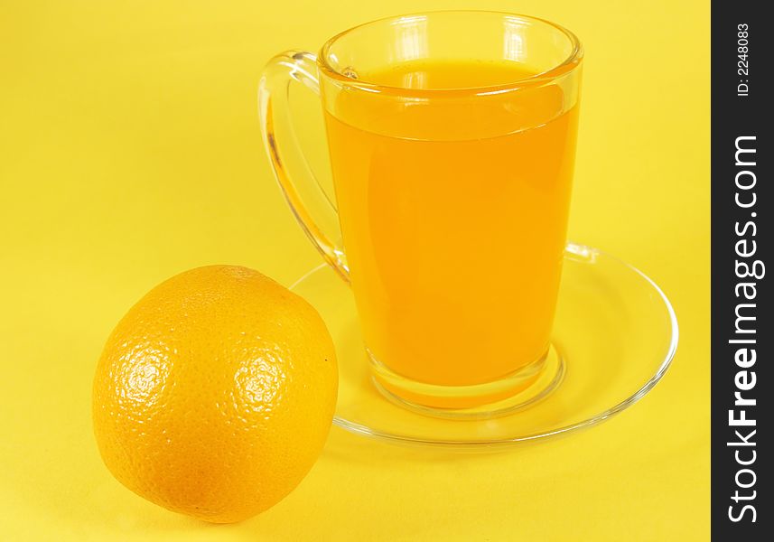 Orange and cup of orange juice