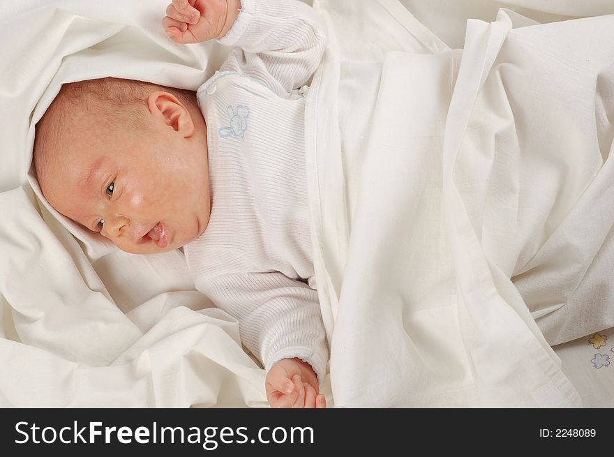 Newborn child on white background. Newborn child on white background