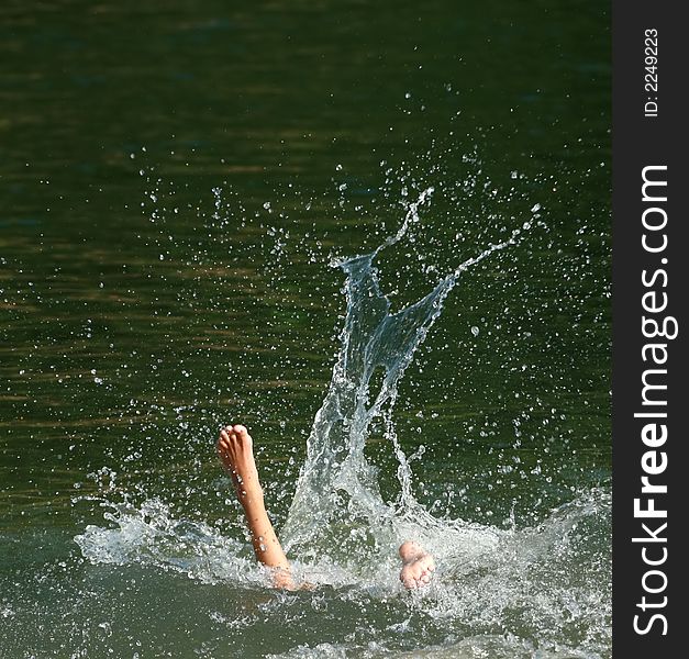 Big splash after the jump in the water