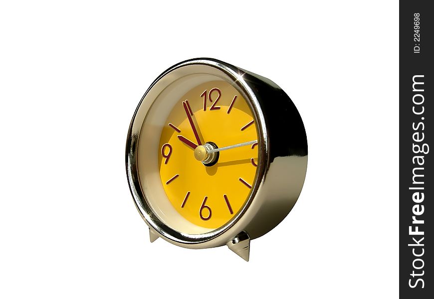 A small yellow clock - retro style - over a white background. A small yellow clock - retro style - over a white background