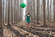 Blonde Girl With Balloon In A Poplar Forest Royalty Free Stock Photos