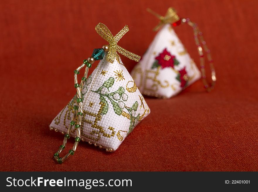 Christmas ornaments decorated with cross stitch. Christmas ornaments decorated with cross stitch