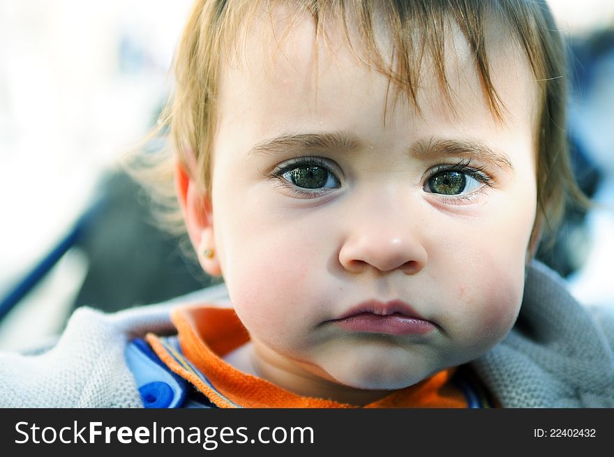 Portrait of a beautiful baby girl with nine months