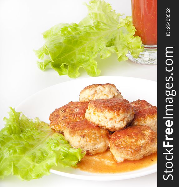 Meat balls on the Japanese dish on a white background. Meat balls on the Japanese dish on a white background