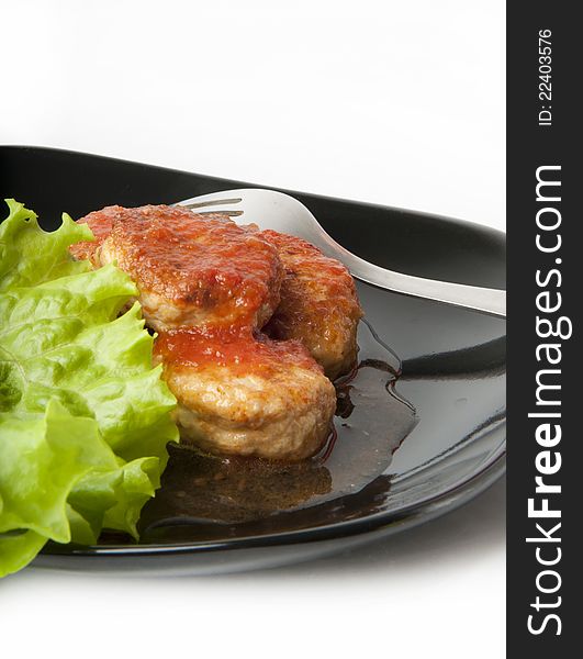 Meat balls on the Japanese dish on a white background. Meat balls on the Japanese dish on a white background