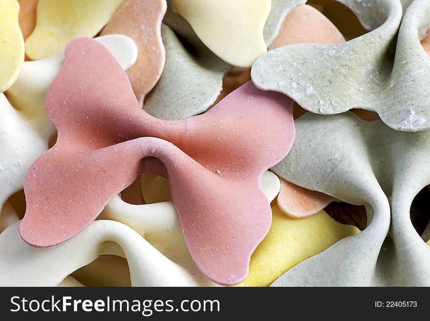 Butterfly-shaped artisan pasta handmade in Italy from Durum wheat semolina with natural ingredients such as spinach, pepper, tomato and beet. Butterfly-shaped artisan pasta handmade in Italy from Durum wheat semolina with natural ingredients such as spinach, pepper, tomato and beet.