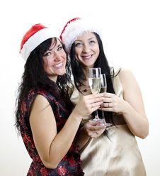 Two Girls In Red Hat Have Fun Royalty Free Stock Photography