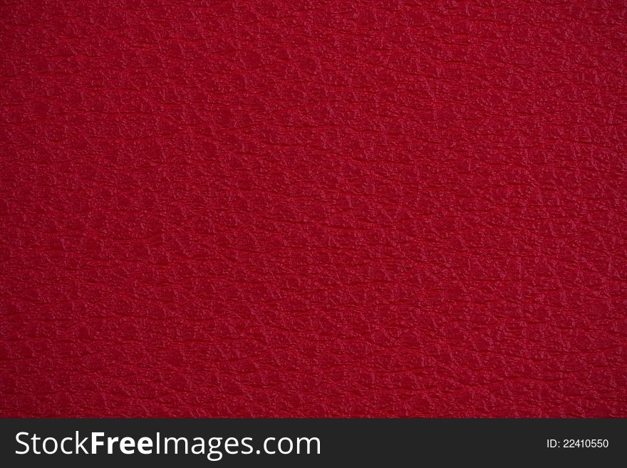 Red leather texture with slight vignette