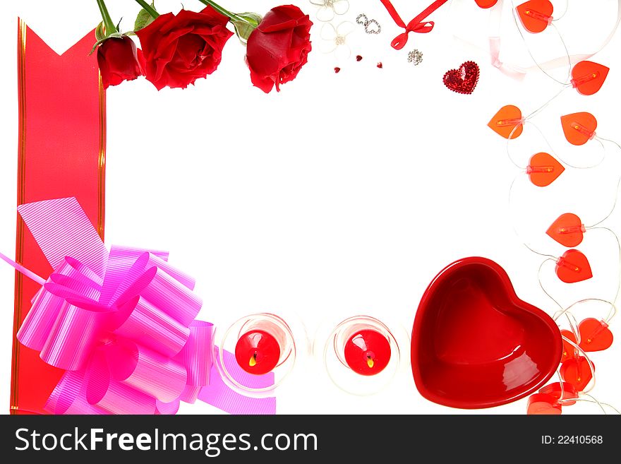 Frame of roses, hearts and candles on a white background. Frame of roses, hearts and candles on a white background